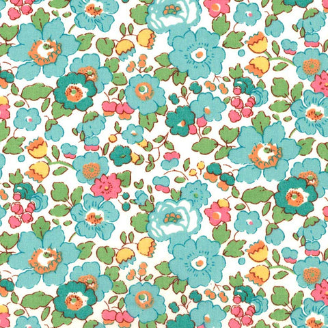 Colorful floral pattern with turquoise, pink, and green flowers on a white background