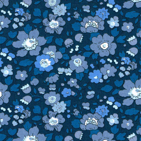 Pattern of blue flowers on a dark blue background