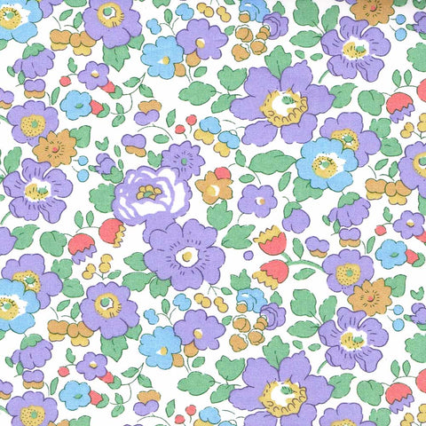 Colorful floral pattern with purple, blue, green, and yellow flowers on a white background.