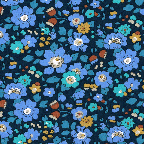 Pattern of blue flowers on a dark blue background