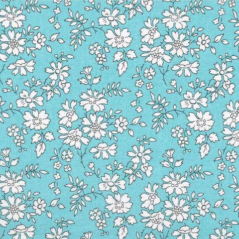 White floral pattern on a blue background