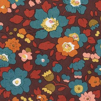 Floral fabric pattern on a brown background