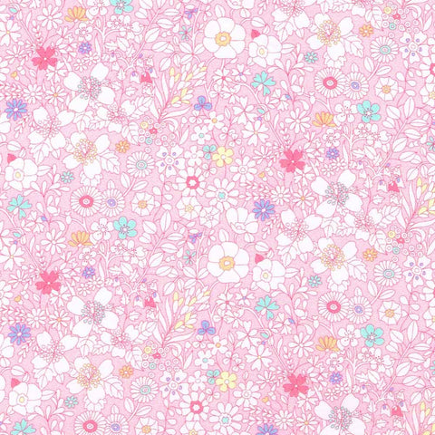 Pattern of small flowers on a pink background