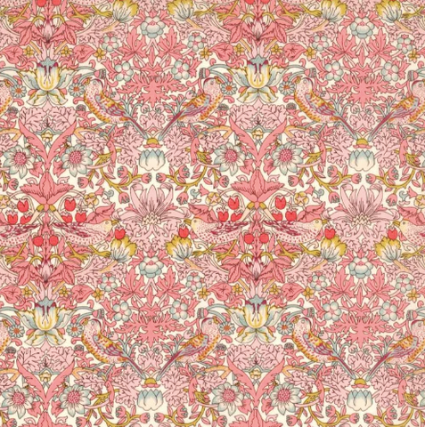 Patterned fabric with pink and multicolor floral design