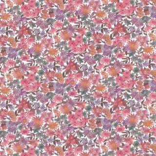 Floral pattern with small flowers in pink, purple, and green on a multicolored background