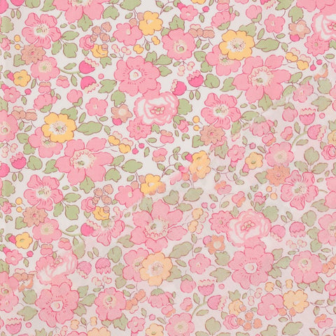 Floral pattern with pink, yellow, and green flowers on a light background