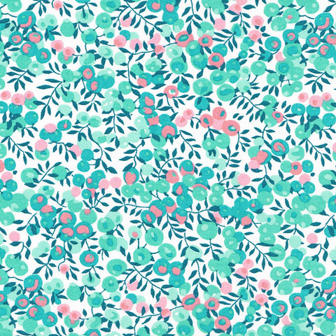 Pattern of small green and pink flowers on a white background