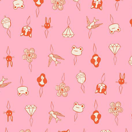 Patterned fabric with small illustrations on a pink background
