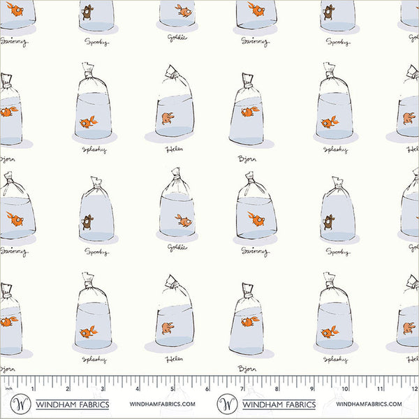 A repeating fabric pattern featuring illustrated clear plastic bags filled with light blue water, each containing a small orange fish, with handwritten-style labels beneath each bag. A ruler strip and Windham Fabrics branding appear along the bottom edge.