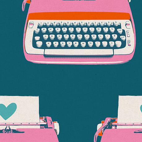 Pink typewriter with a blue background and heart designs,