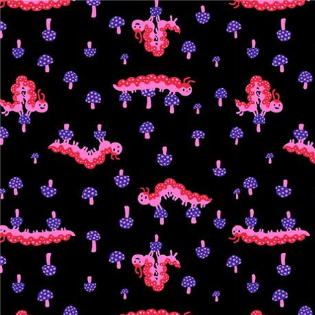 Patterned fabric with pink and purple designs on a black background
