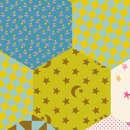 Fabric swatch with a patchwork pattern featuring stars, checkers, and polka dots 