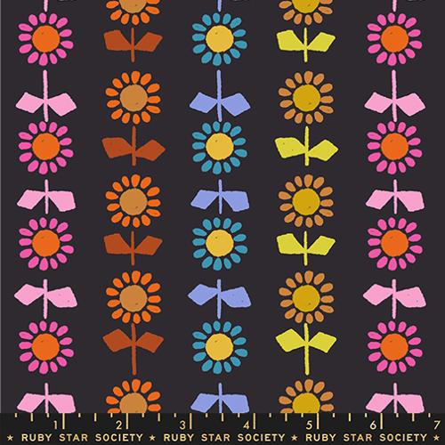 Colorful floral pattern with a ruler at the bottom on a black background, featuring the Ruby Star Society logo.