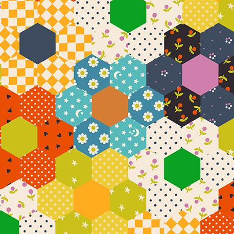 Colorful hexagonal pattern fabric with various shapes and patterns on a white background