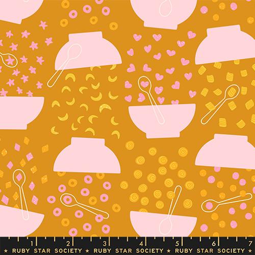 Patterned fabric with pink bowls and spoons on a mustard background, featuring the Ruby Star Society label.