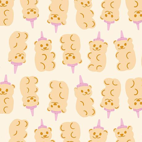 Pattern of teddy bear-shaped candies with purple sticks on a beige background