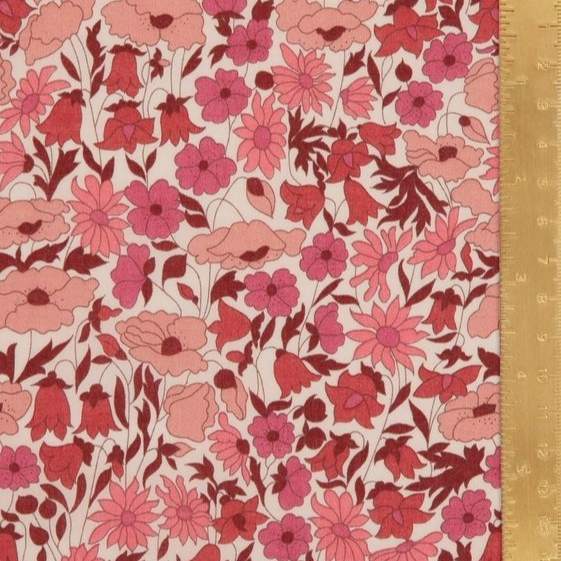 Floral fabric pattern with a ruler on the right side