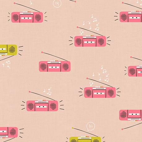Pattern of retro radios and cassette tapes on a pale pink background 