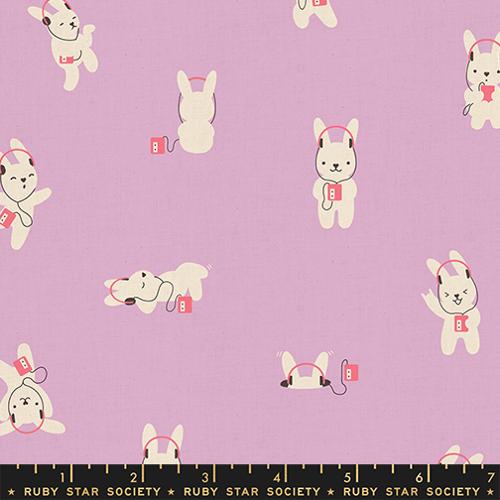 Pattern of cartoon dogs with headphones on a purple background, featuring Ruby Star Society label.