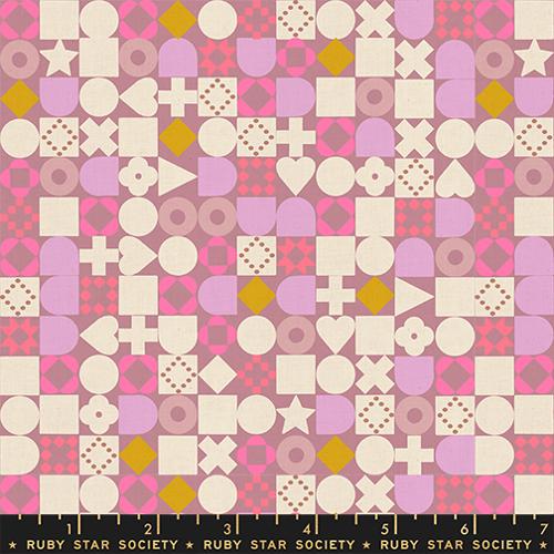 Patterned fabric with geometric shapes on a pink background, featuring the Ruby Star Society label.