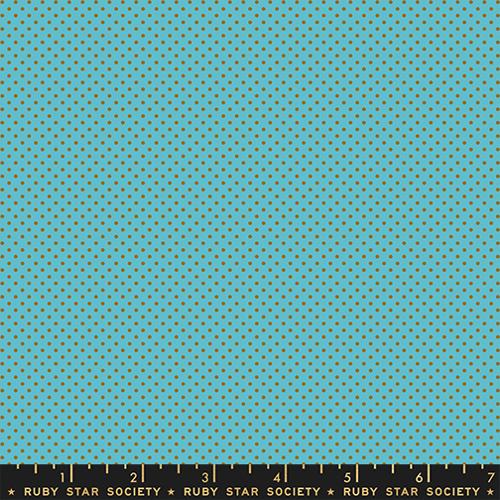 Fabric swatch with a turquoise background and gold polka dots, labeled 'Ruby Star Society'.
