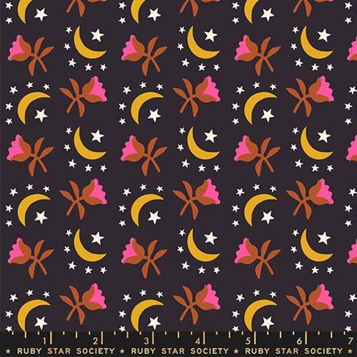 Patterned fabric with moons, stars, and flowers on a dark background, featuring Ruby Star Society label.