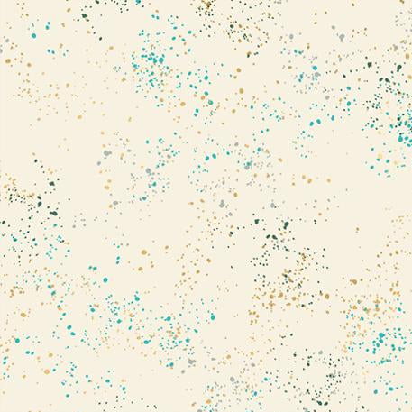 A fabric pattern swatch featuring a cream-colored background with scattered teal, gold, and dark green speckles