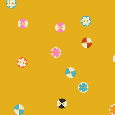 Colorful geometric shapes on a mustard yellow background 