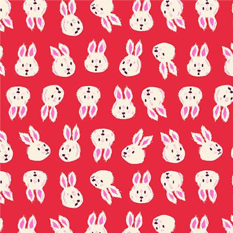 Pattern of white bunnies with pink ears on a red background