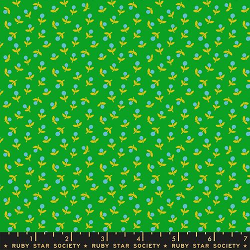 Fabric with small floral pattern on a green background, featuring the Ruby Star Society label.