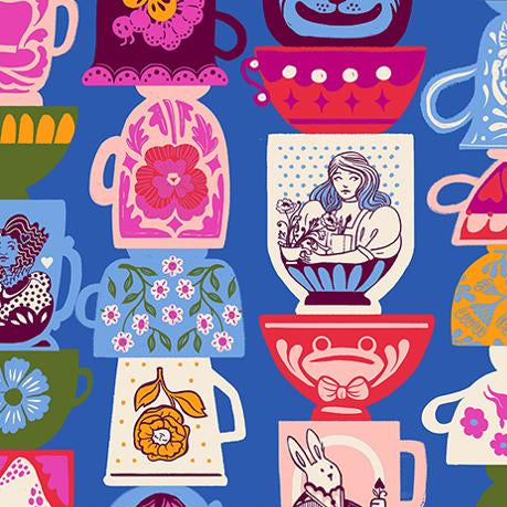 Colorful fabric pattern with teacups and floral designs on a blue background.