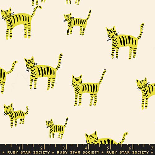 Pattern of yellow and black striped cats on a beige background with a ruler at the bottom.