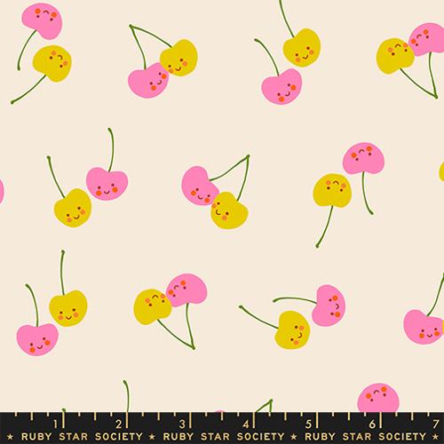 Pattern of colorful cherries with faces on a beige background, featuring a ruler at the bottom.
