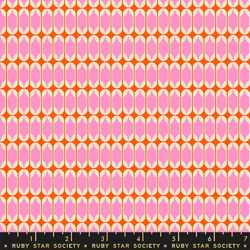 Patterned fabric with pink shapes on an orange background, featuring Ruby Star Society label.
