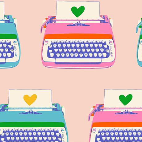 Pattern of colorful typewriters with hearts on a pink background.