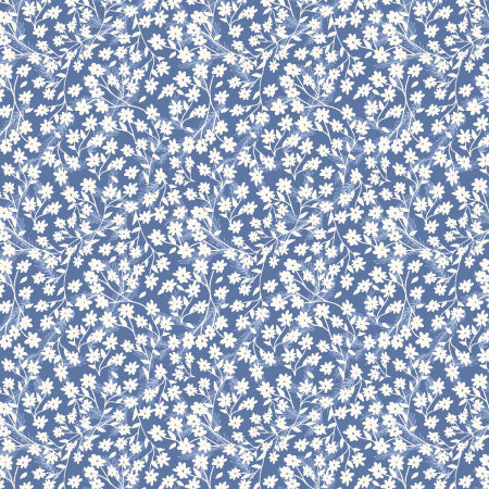 Pattern of small white flowers on a blue background