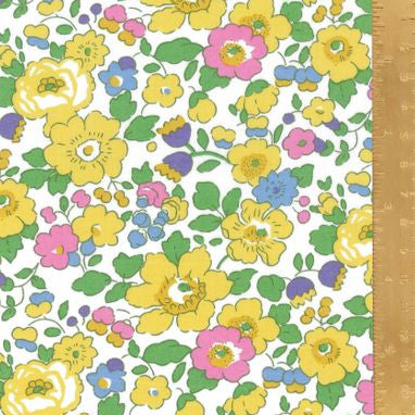 Floral patterned paper with a ruler on the right side