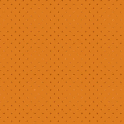 A close-up of a repeating pattern featuring small dark brown plus signs arranged in a grid over a solid orange background.