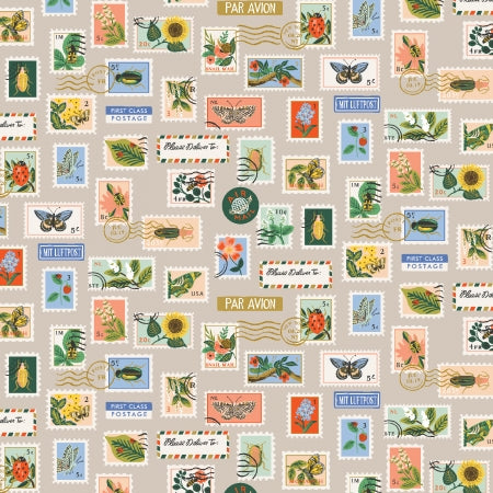 Pattern of vintage postage stamps and postcards on a beige background