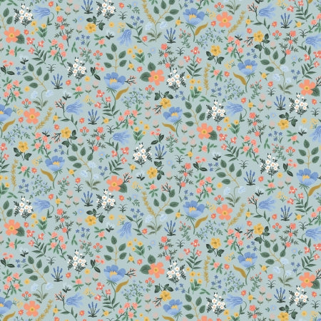Pattern of colorful flowers and leaves on a light blue background